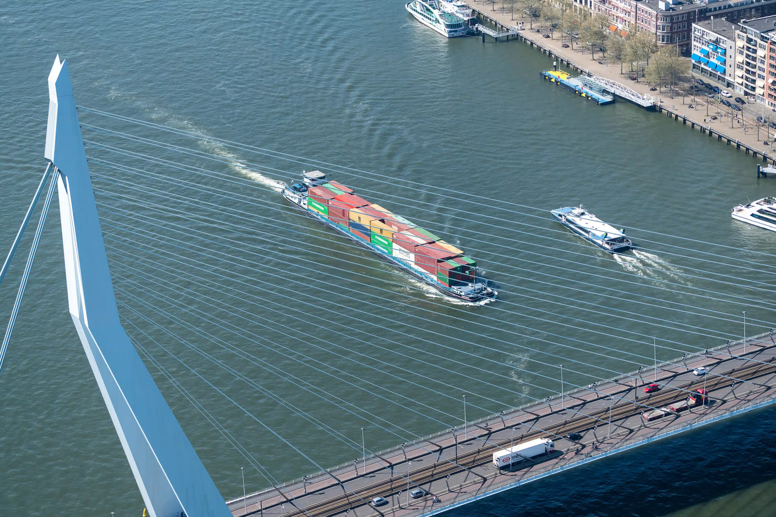 a large container ship on a river